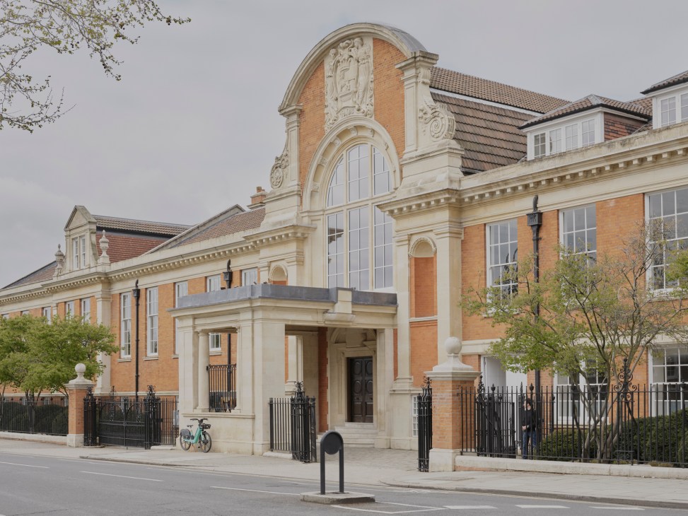 Exterior of Ladbroke Hall, a historic brick building with arched windows and cream-colored stone details in London.