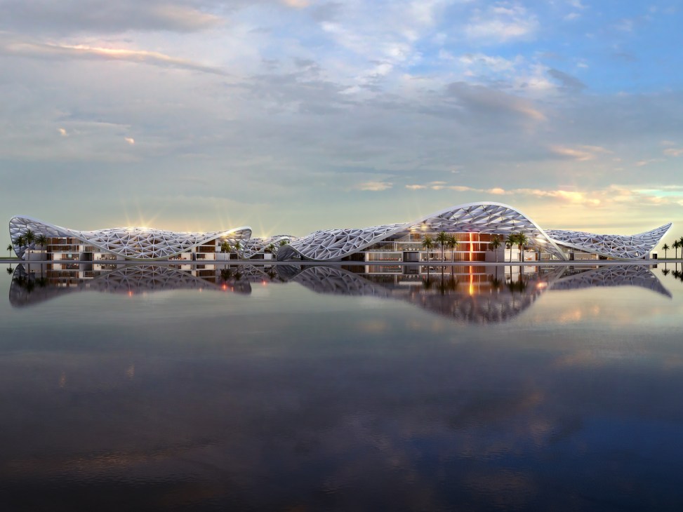 Architectural rendering of Dubai Reefs, a futuristic floating sustainable community with wave-shaped white structures reflected in calm water.