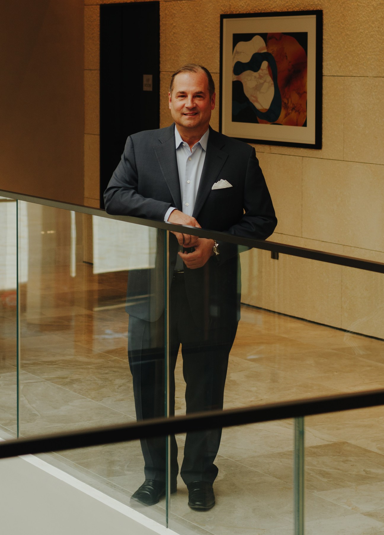 Anthony Capuano, CEO of Marriott International, in business attire at a hotel setting