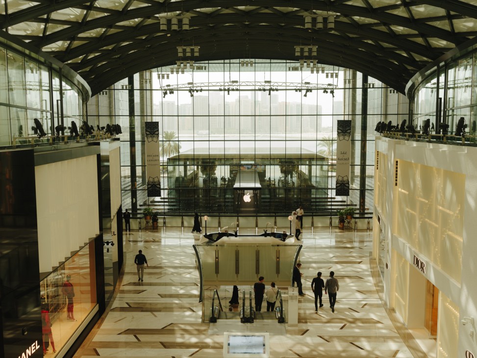 Interior of The Galleria mall in Abu Dhabi showing a spacious modern shopping center with glass ceilings and multiple levels