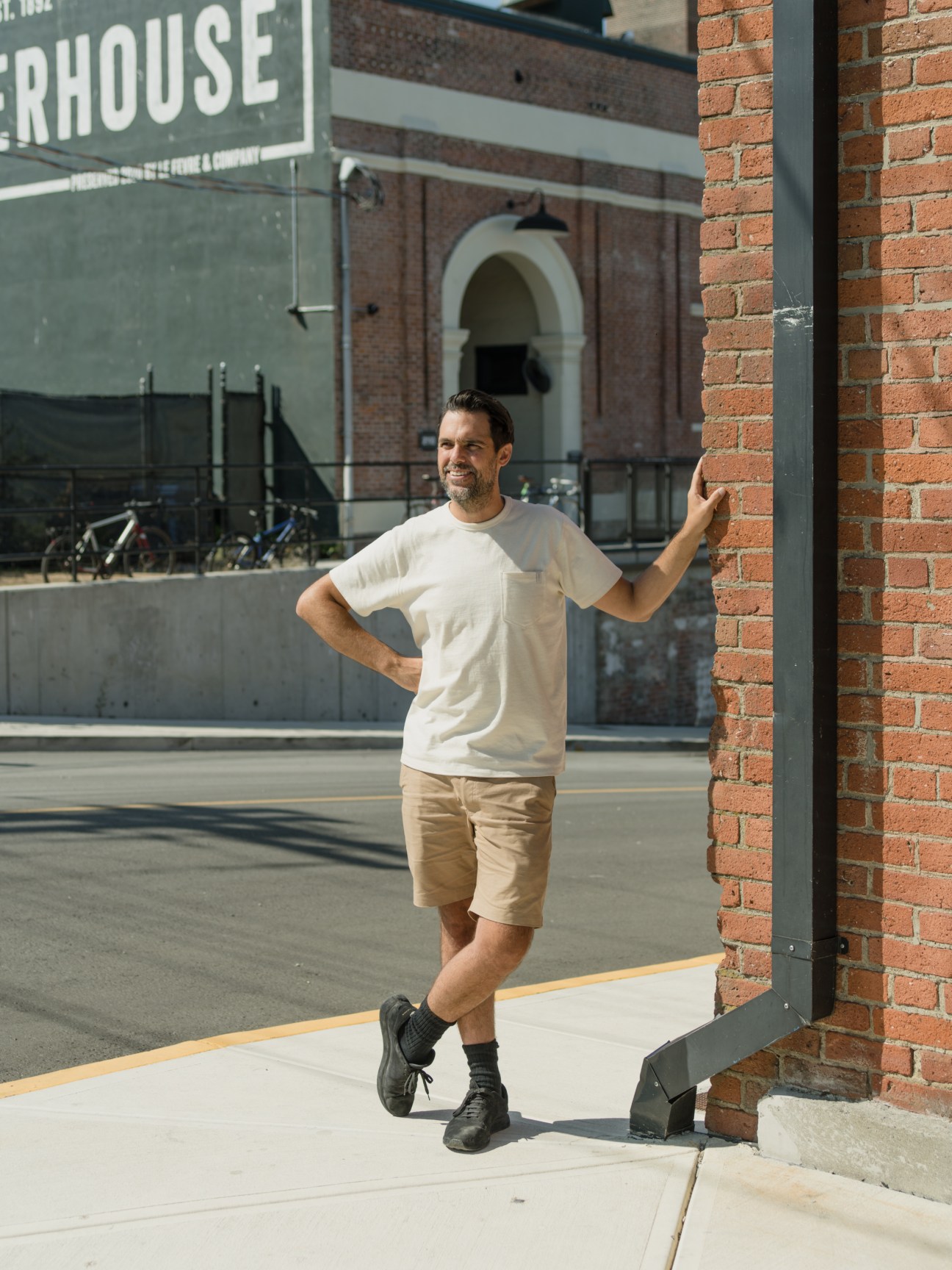 Rene Gauthier, founder of Ecologyst, posing outside a brick building
