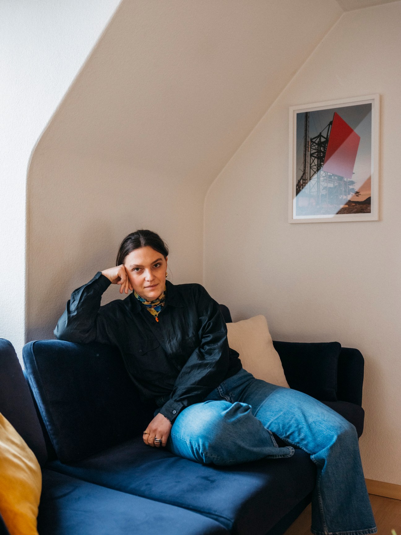 a young woman sitting on a sofa