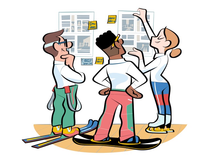 Three people in business attire wearing skis indoors looking at documents on a wall