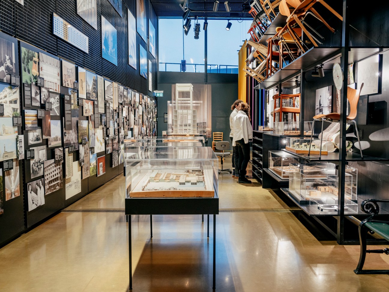 Exhibition display at the Danish Architecture Center showing architectural models