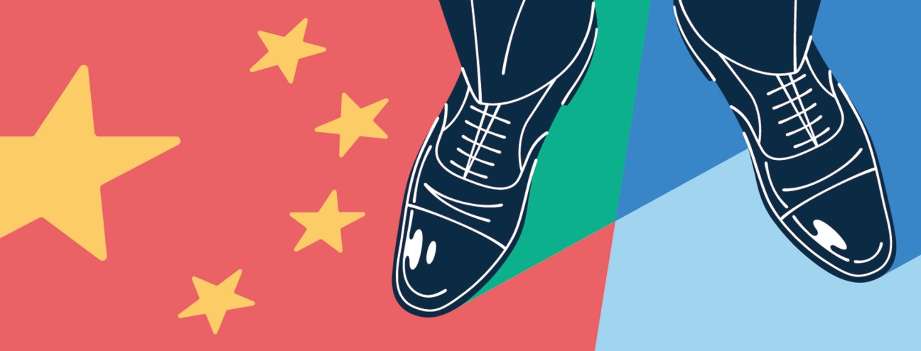 Illustration of feet in sneakers standing on a divided surface with Chinese flag stars and US flag colors.