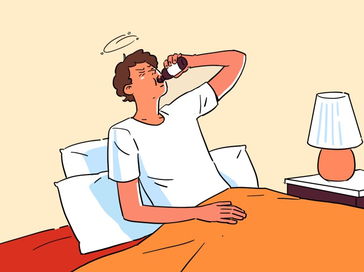 Illustration of a person sitting at a desk with headphones, holding a bottle to their mouth, with a halo above their head and a lamp nearby.