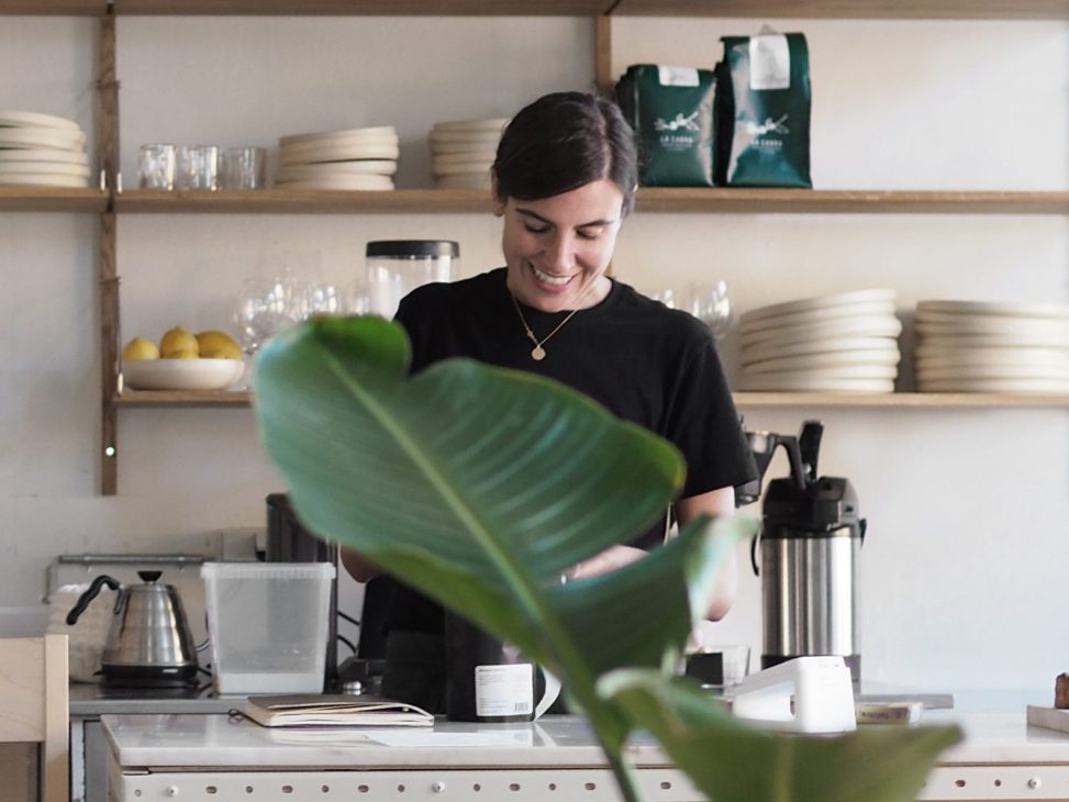 Chef Chiara Barla working behind the counter at Frama Apotek 57 in Copenhagen