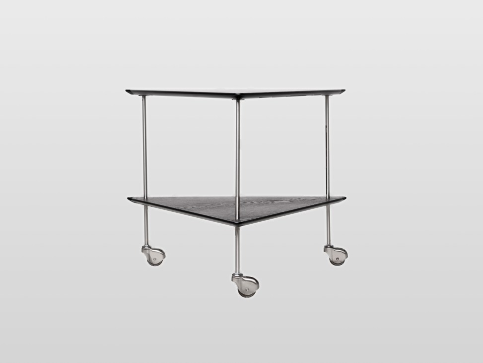 AJ Trolley by Arne Jacobsen for Fritz Hansen, a 1950s bar cart with curved black shelves and metal frame on casters.