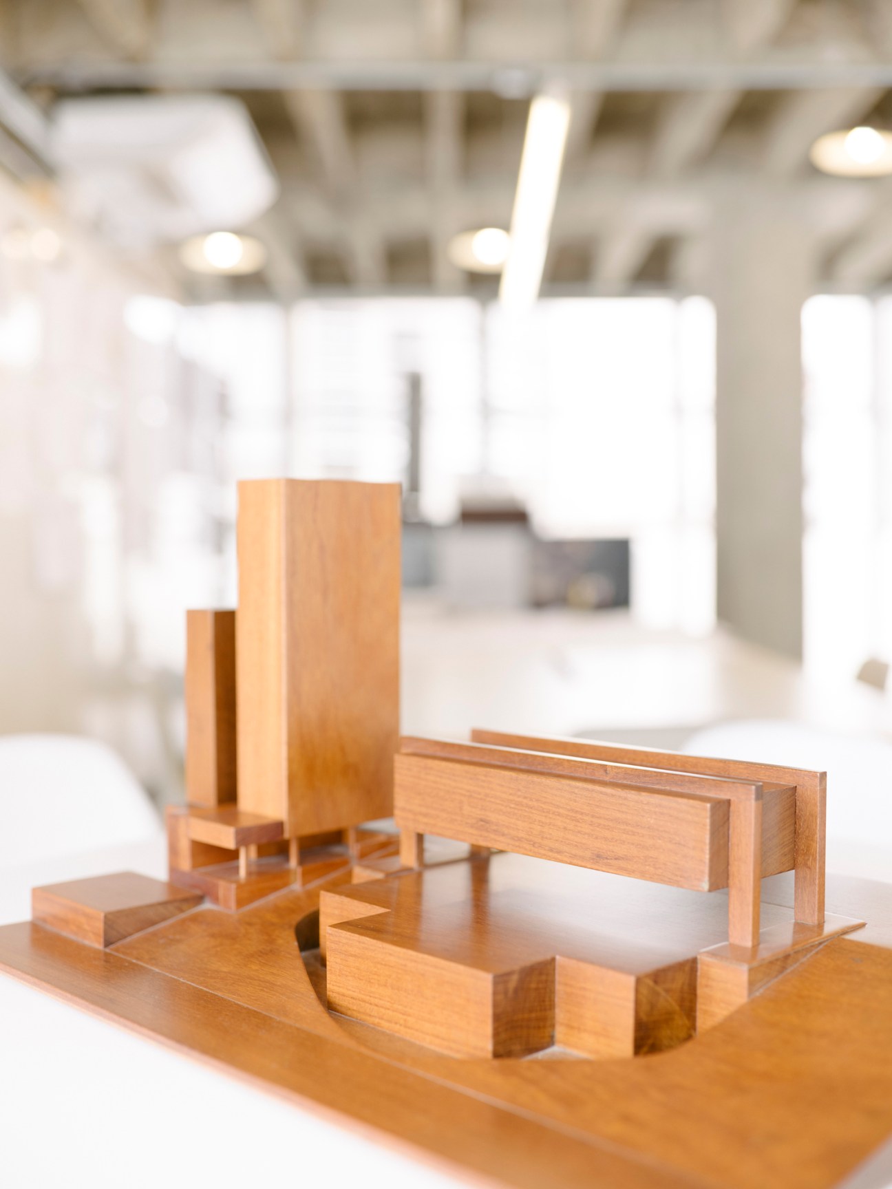 Architectural model of a modern museum building with clean geometric lines