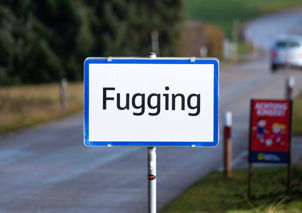 Road sign for the Austrian village of Fugging, now renamed Fugging to prevent theft and mockery.