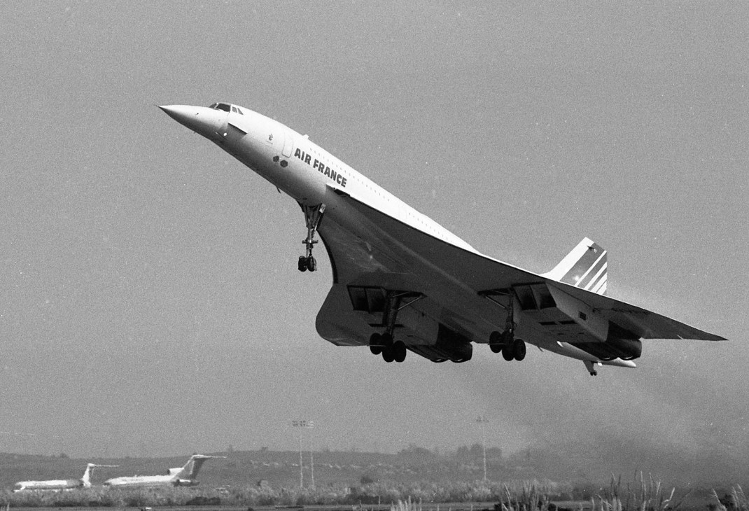 Air France Concorde supersonic aircraft in flight with landing gear extended