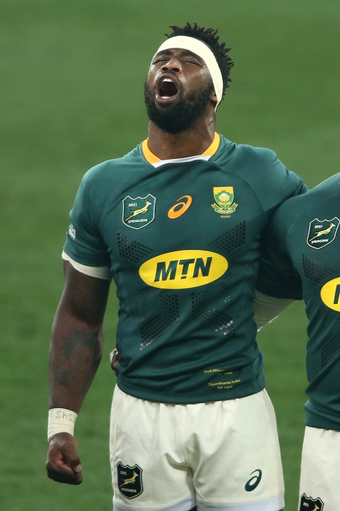 South African rugby team’s captain, Siyamthanda Kolisi celebrates during a game.
