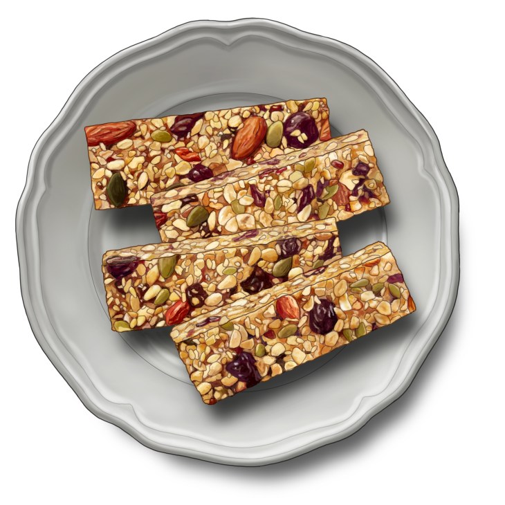 Swiss granola bars cut into rectangles on a pewter plate showing nuts, seeds and dried fruit