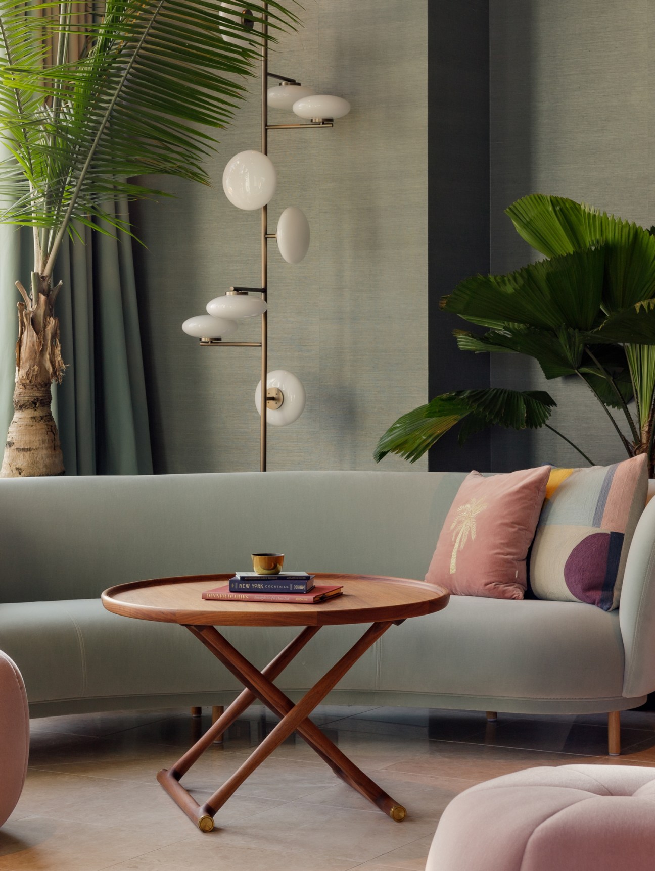 Comfortable lounge area at Carlyle & Co featuring plush seating and warm interior design