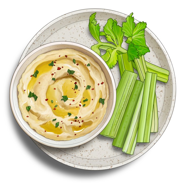 Bowl of hummus with olive oil drizzled in center and celery sticks on side plate