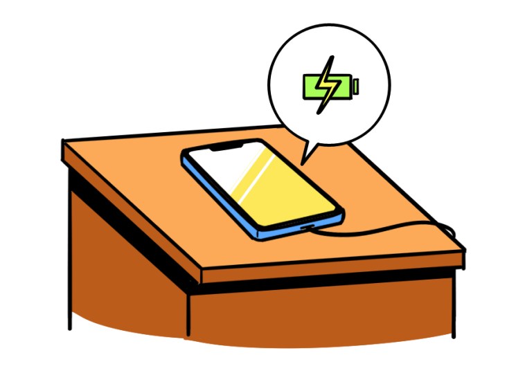 Illustration of a smartphone charging on a desk with a battery icon in a speech bubble.