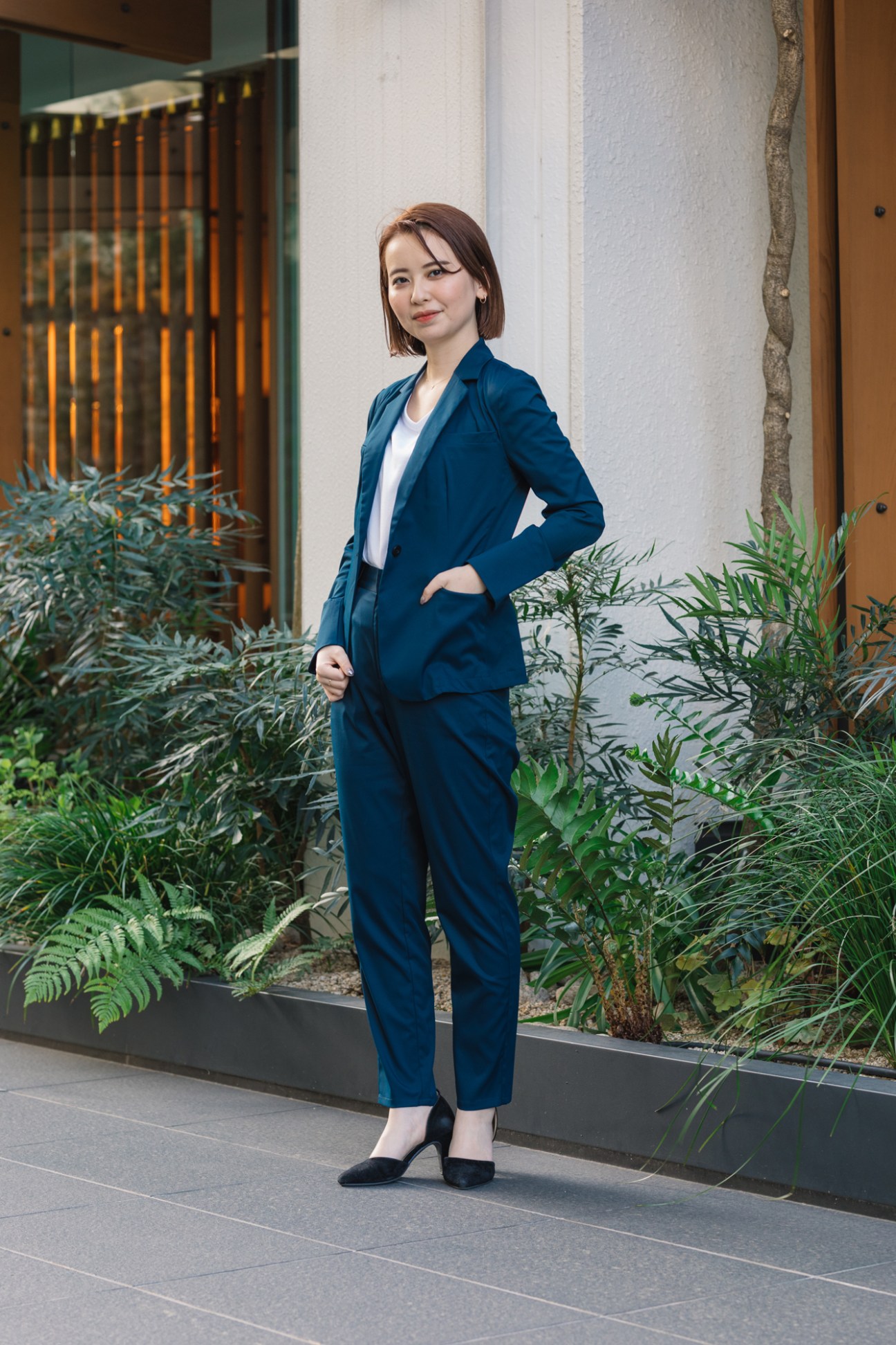 Japanese entrepreneur Yuzo Sekiya in dark blue Work Wear Suit outfit.