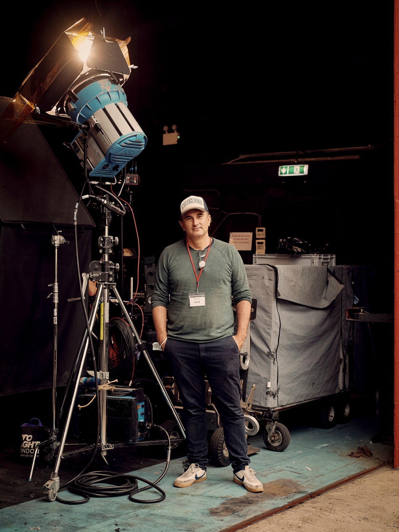 Film production crew working on set in desert location