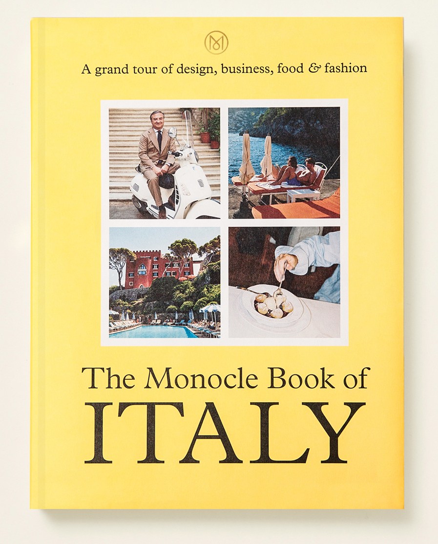 The Monocle Book of Italy coffee table book with yellow cover featuring four photographs of Italian scenes