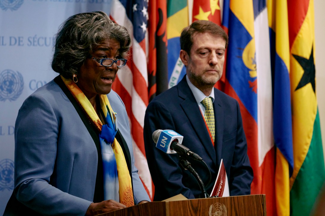 Linda Thomas-Greenfield speaks at a UN podium with Albania's Ferit Hoxha beside her.