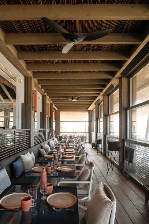 Interior seating area with ocean view from every seat
