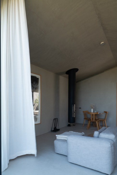 Lounge area decorated with natural wood and stone materials