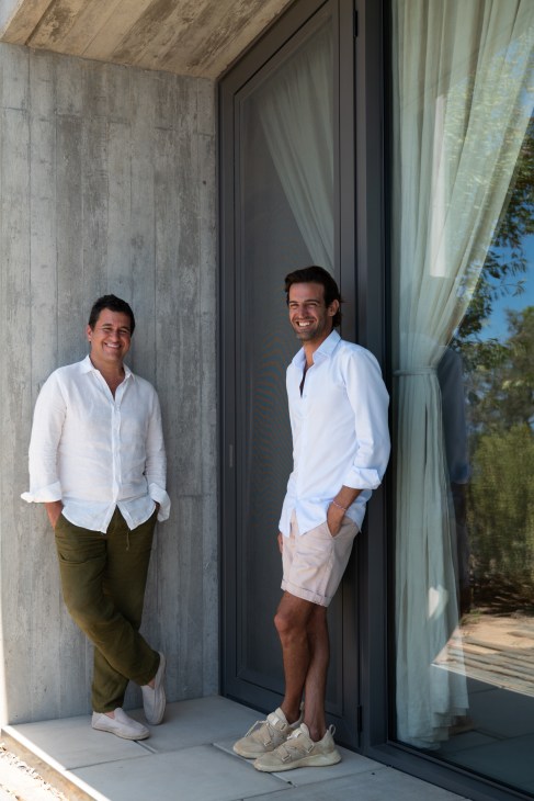 Miguel Charters and Filipe Lopo standing together at their property