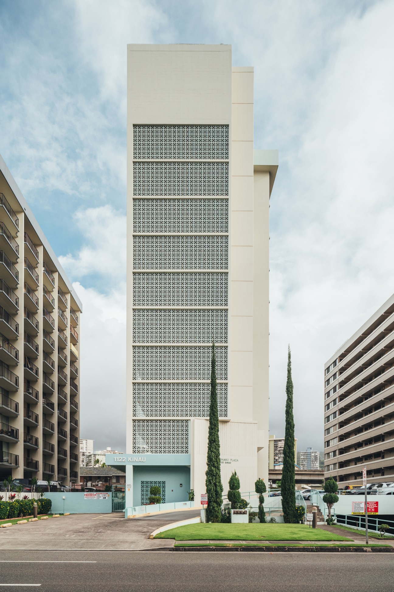 Close-up view of concrete breeze blocks showing intricate lattice pattern that allows air circulation