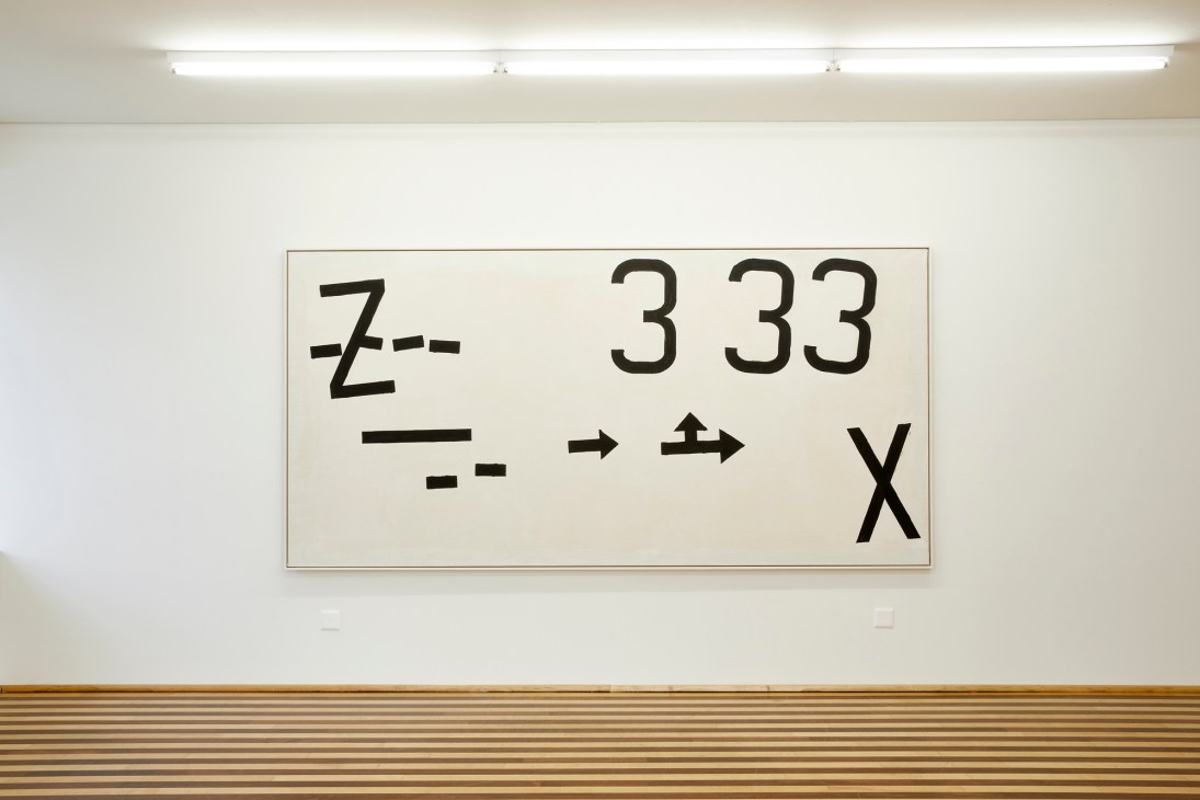 Works by Jannis Kounellis displayed in white gallery space