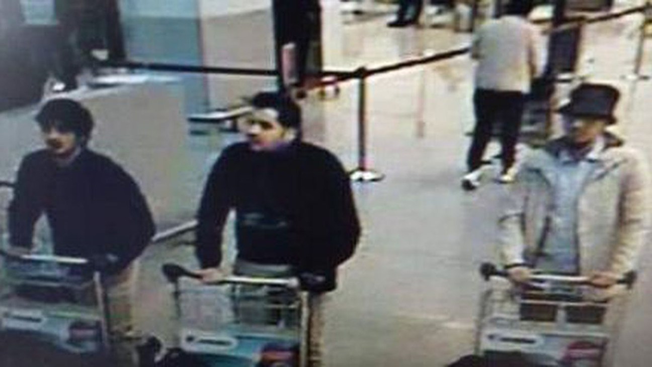 Security camera footage from Brussels Airport showing three men with luggage trolleys before the bombing