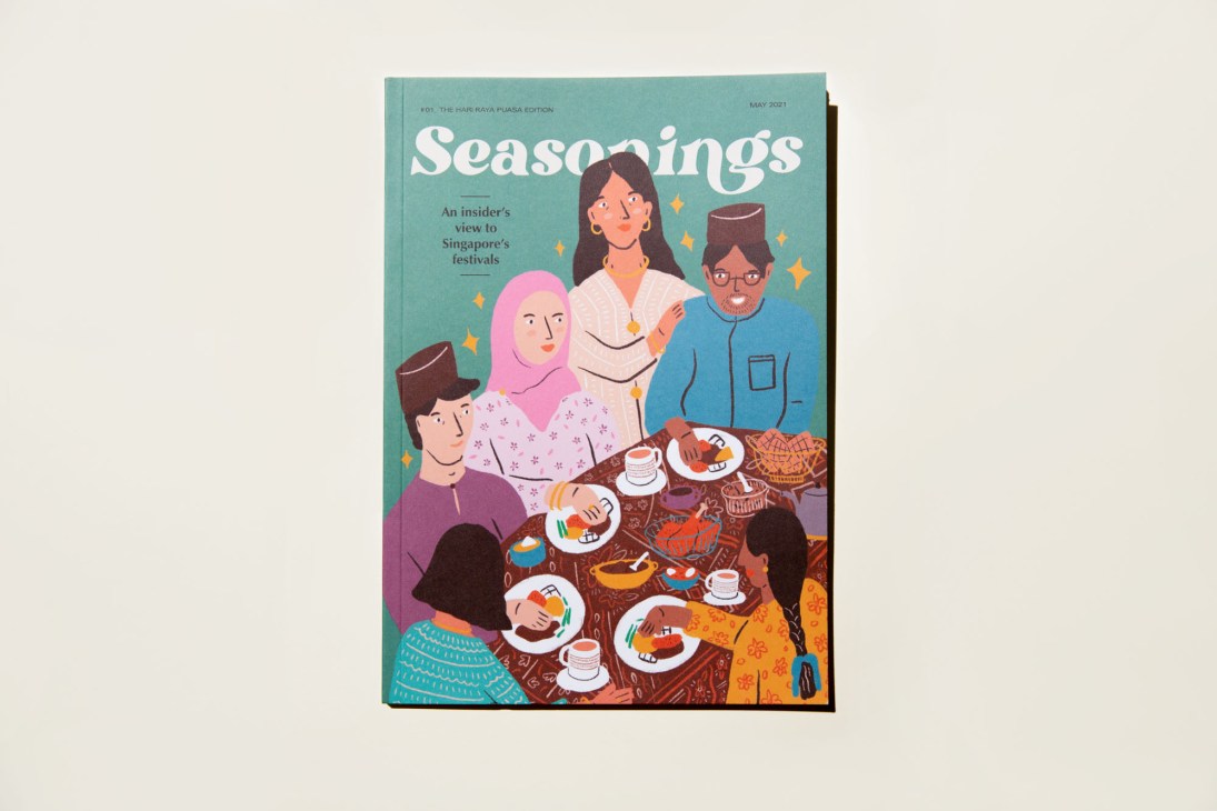 Cover of Seasonings magazine showing illustrated diverse group of people sharing a meal together at a table