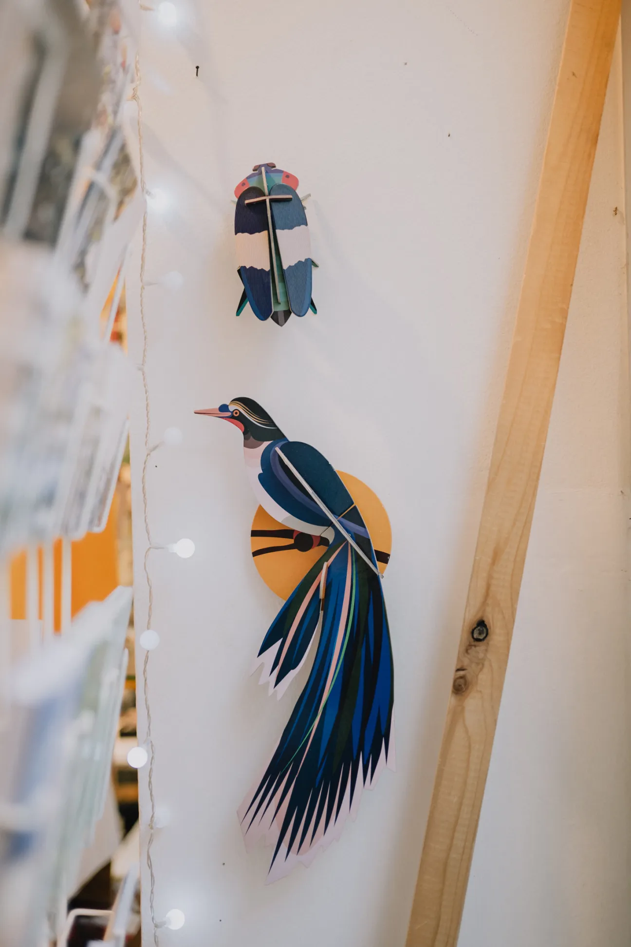 Close-up of handbound notebooks and custom wrapping paper at Lúd Labor
