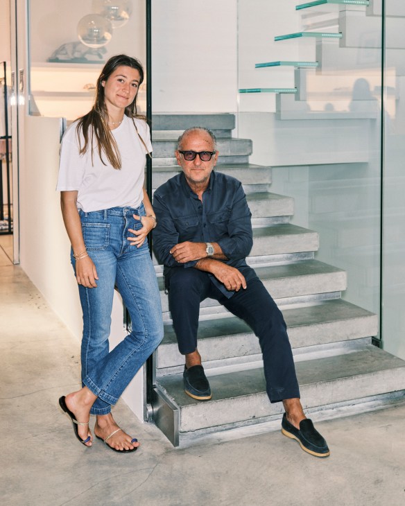 Andrea and Annagreta Panconesi pose on stairs at Luisa Via Roma department store in Florence.