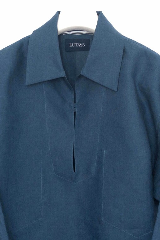 Navy blue linen shirt with collar and partial button placket on hanger