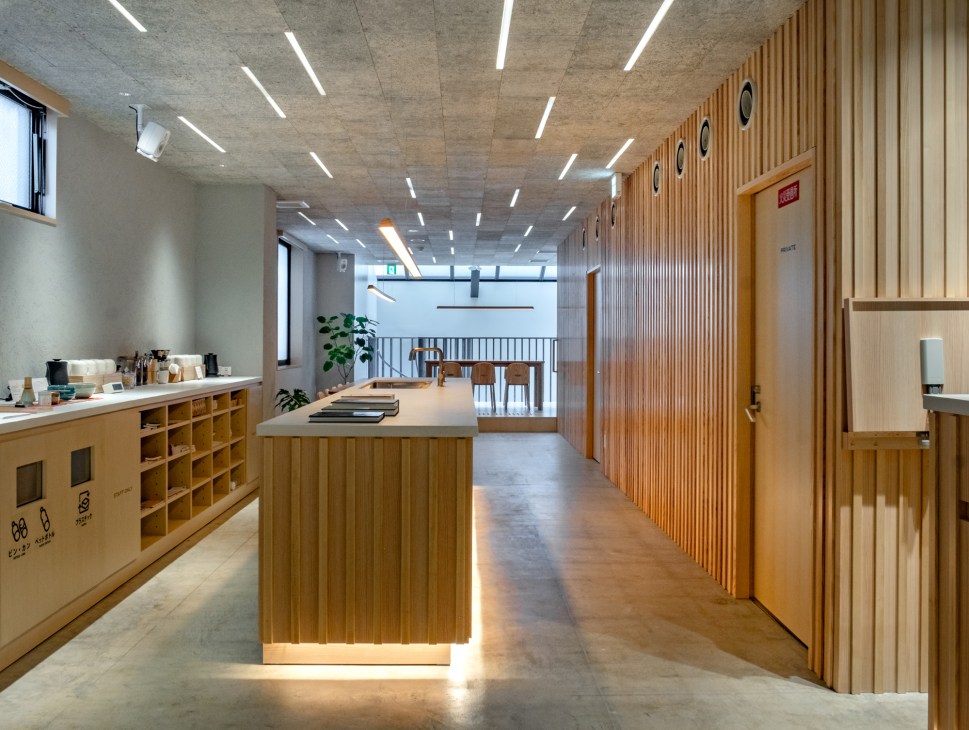 Interior view of Maja Hotel Kyoto showing warm wooden construction details and Nordic-inspired design elements