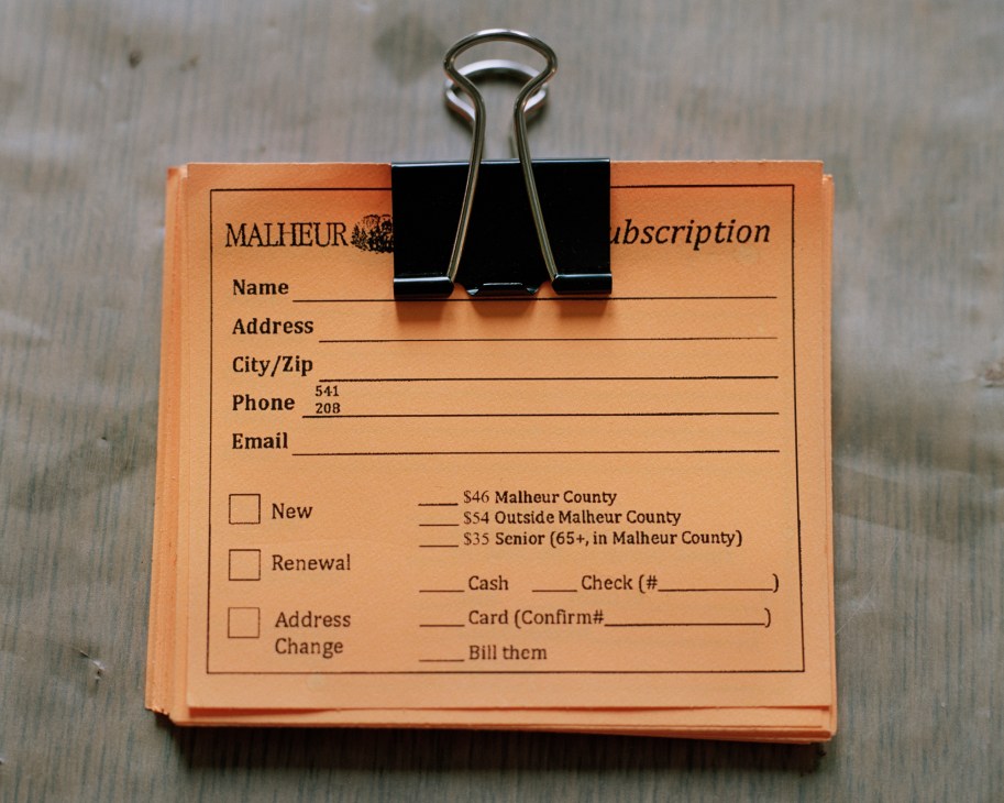 Newspaper subscription stub cards organized in the Enterprise office