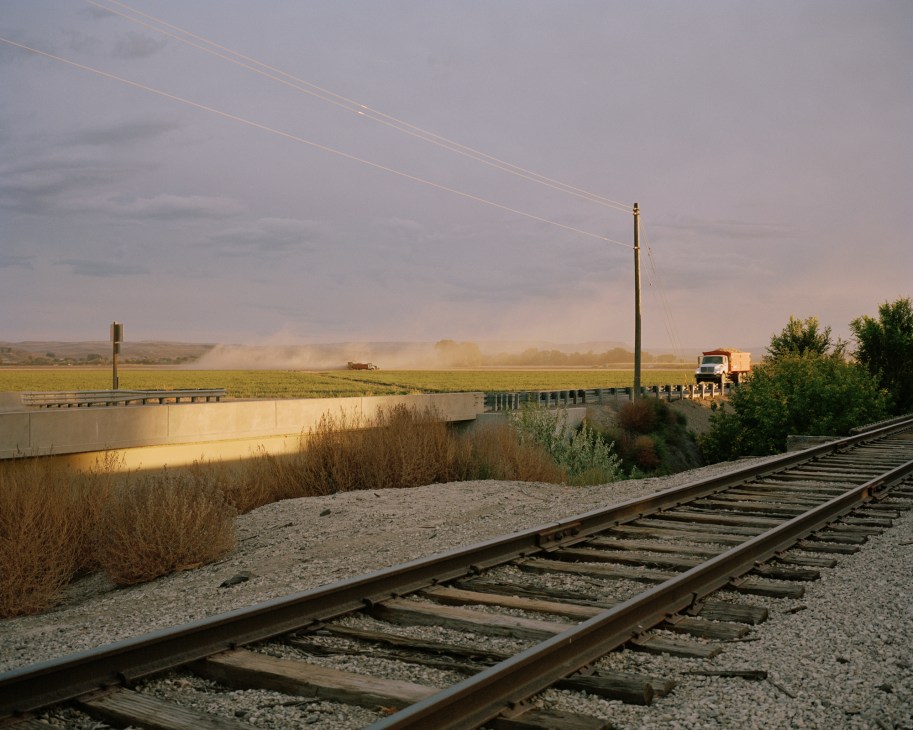 Expansive agricultural fields stretching across the rural landscape of Malheur County