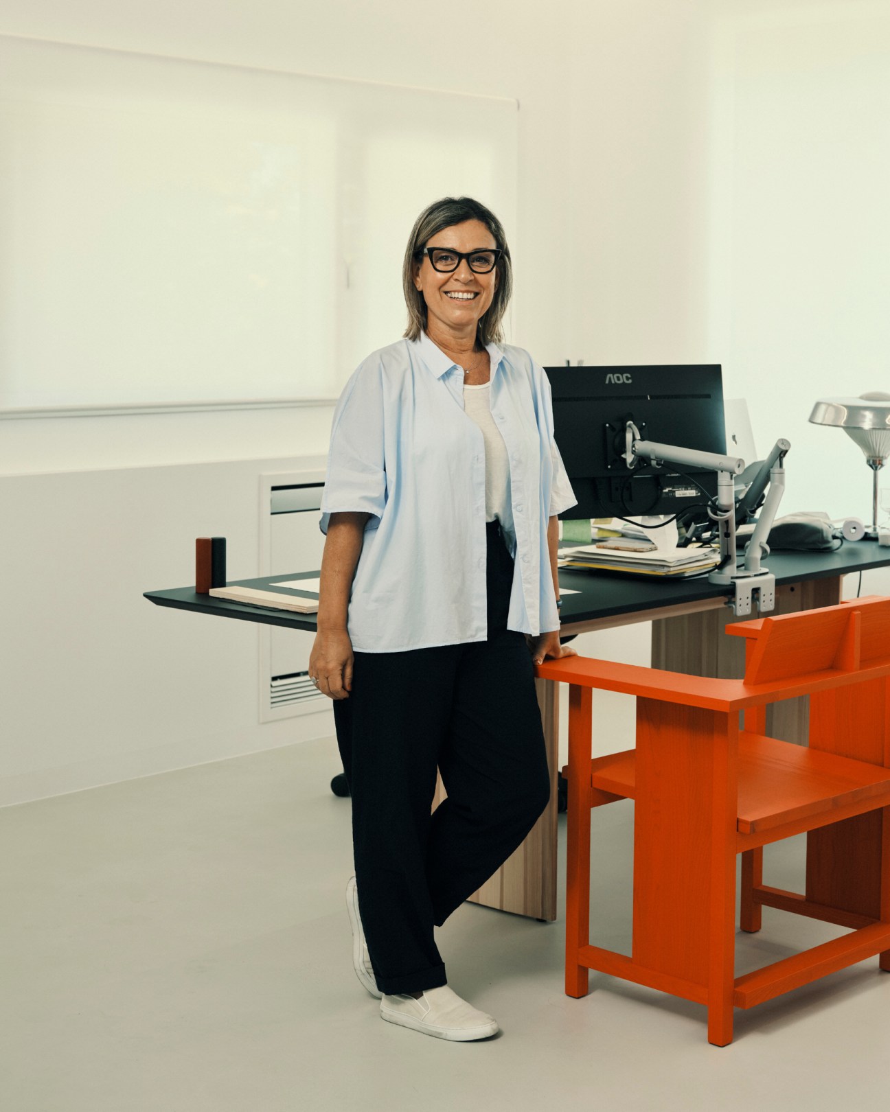 Portrait of Cristina Salvati, marketing director at Mattiazzi, standing in a modern office workspace