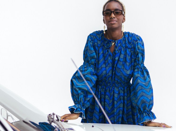 Youssouf Fofana from Maison Château Rouge wearing blue patterned African wax fabric shirt in Paris