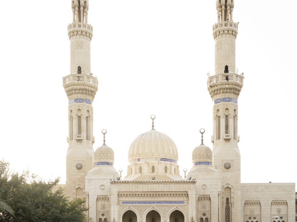 Umm al-Tabul Mosque with its distinctive minarets and dome structure in Baghdad
