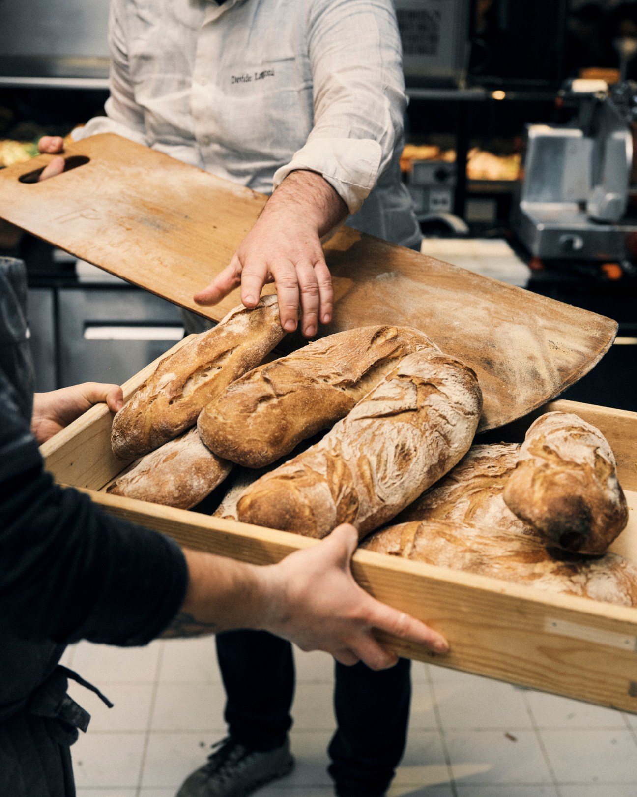 Fresh bread loaves from Davide Longoni displayed at Mercato Centrale Milano