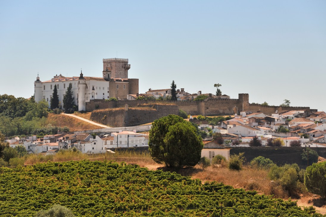 Historic hillside town of Estremoz with whitewashed buildings, medieval castle and fortified walls in Portugal