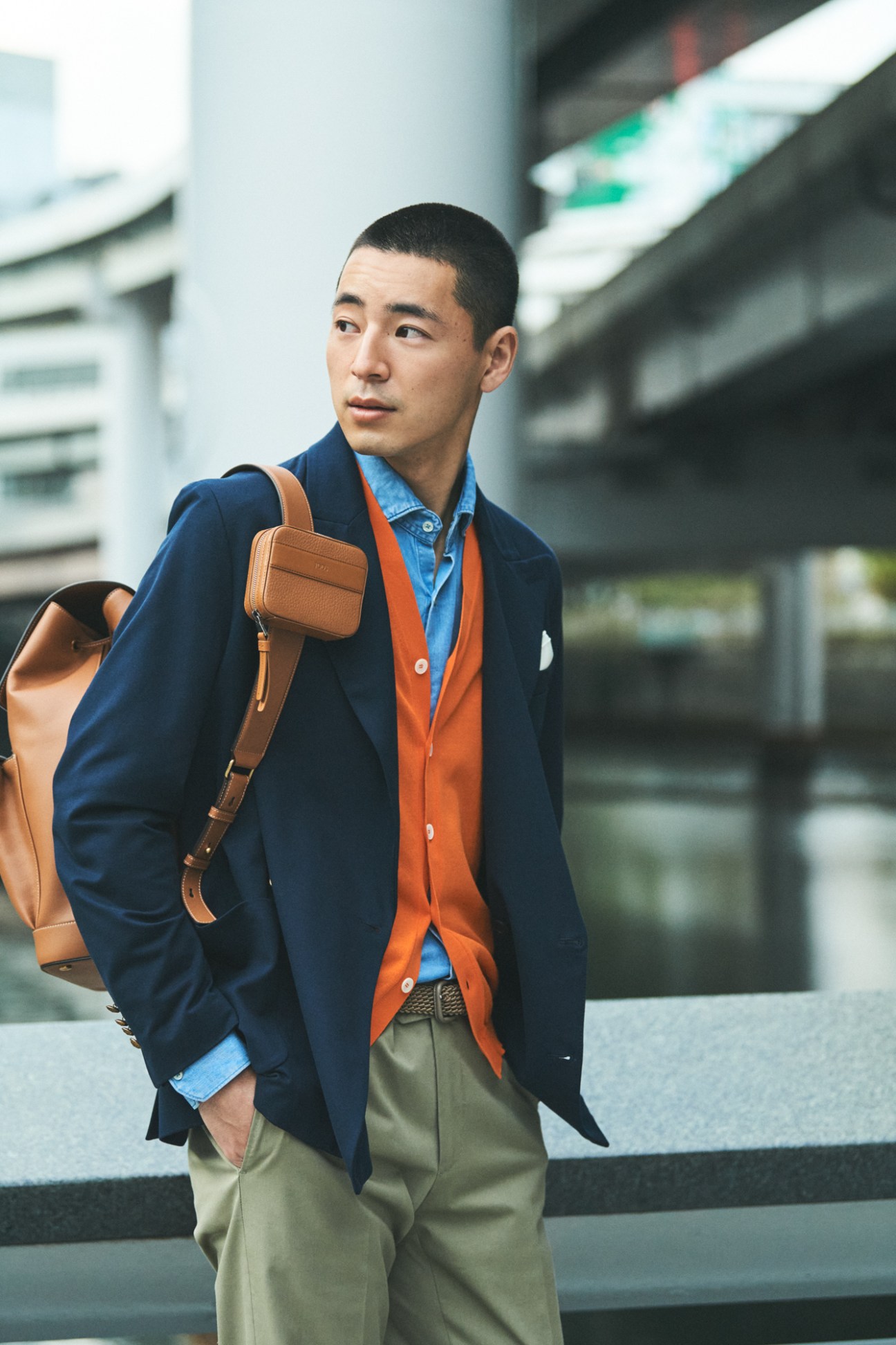 Person wearing contemporary Japanese streetwear in Tokyo setting