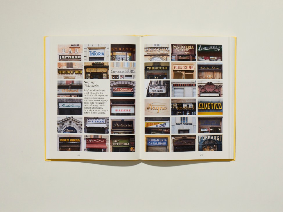 Open book showing Italian storefront signage collection with various shop signs and typography examples