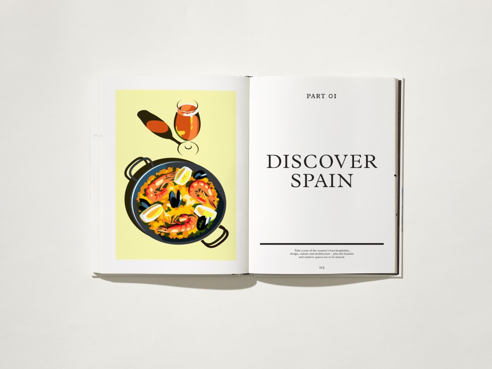 Monocle's Discover Spain handbook showing an illustrated paella and wine on the left page with Part 01 introduction on the right.