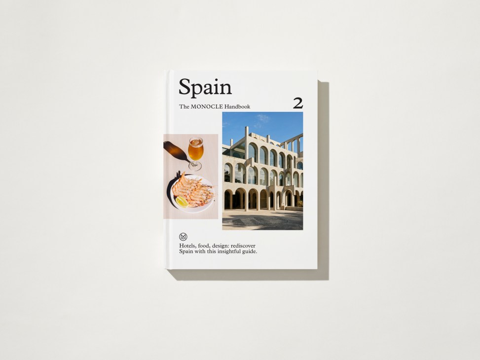Cover of Spain: The Monocle Handbook showing food, architecture and design imagery.