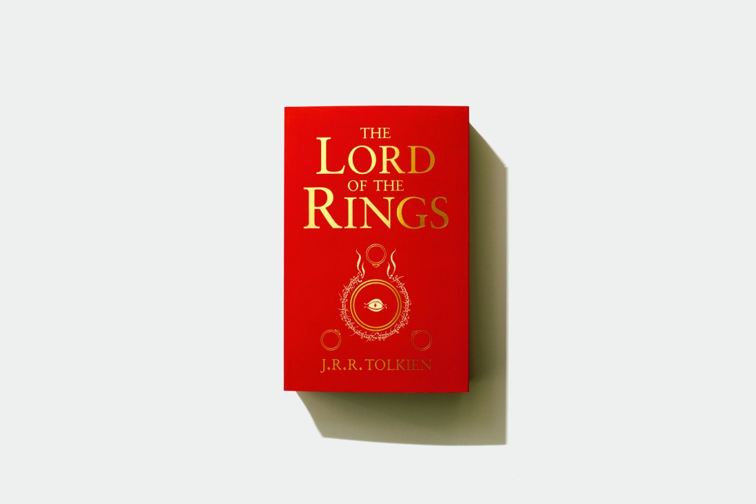 The Lord of the Rings by J.R.R. Tolkien with red cover and gold lettering.