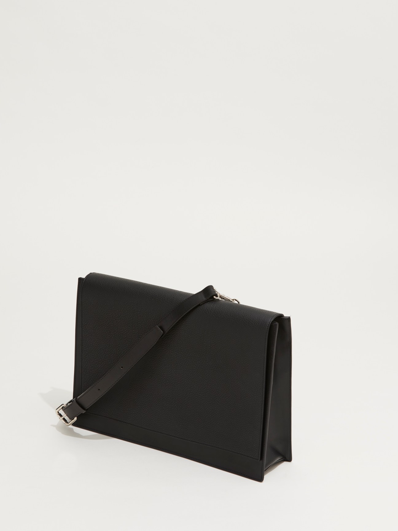 Messenger bag by Nosakhari in black leather with adjustable strap and minimalist design