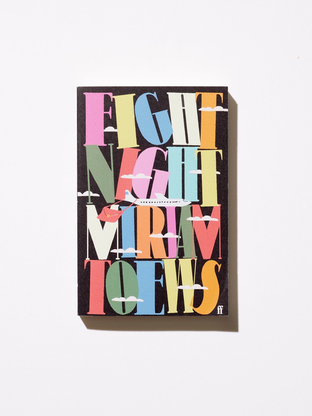 Colorful typographic book cover displaying 'FIGHT NIGHT MERRY POEMS' in varied colored letters on black background