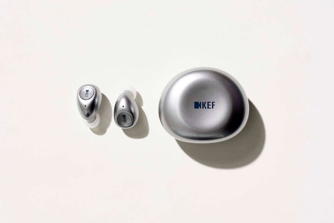 KEF Mu3 earphones designed by Ross Lovegrove showing sculptural curved form in white.